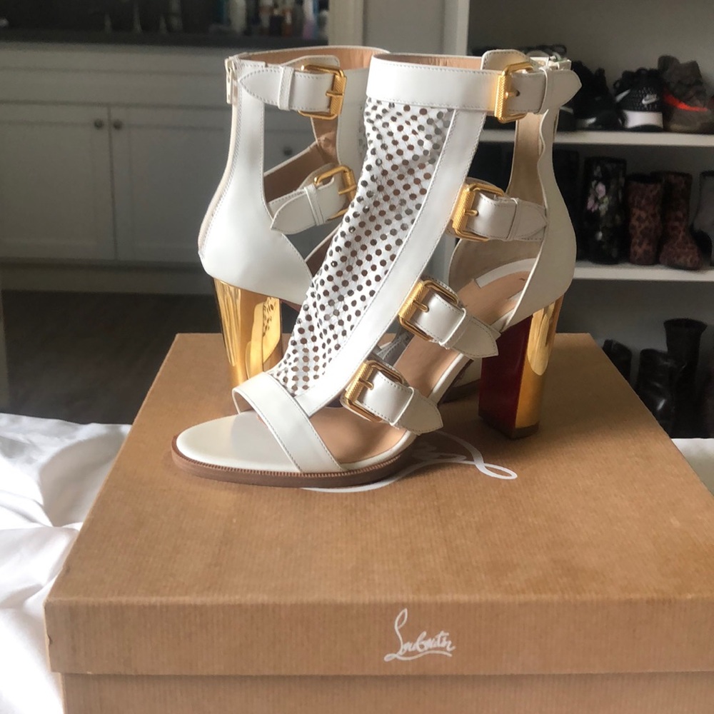 Christian Louboutin White boots w/ gold hardware
